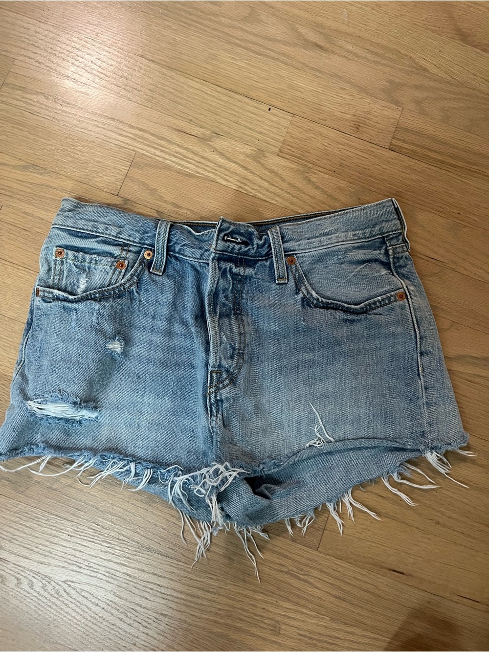 Levi’s Women’s Distressed Denim Cutoff Shorts in Light Blue